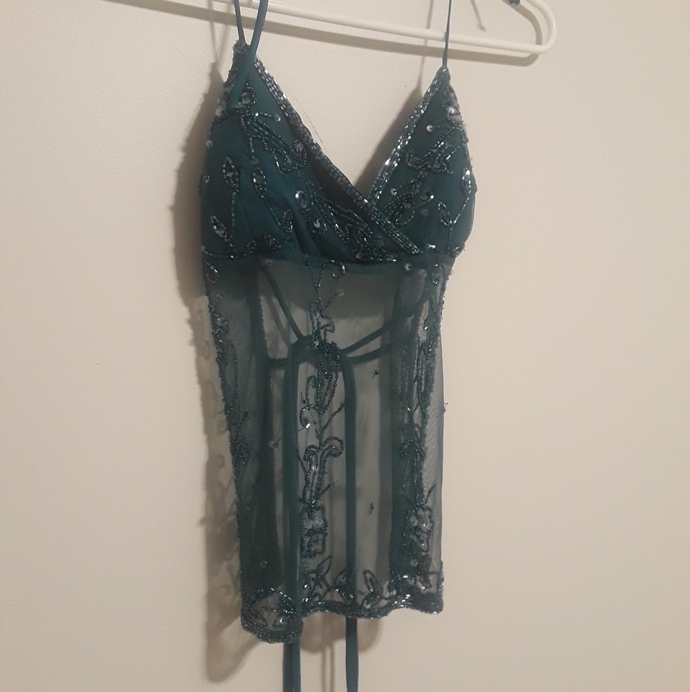 Turquoise sequins, sheer blouse